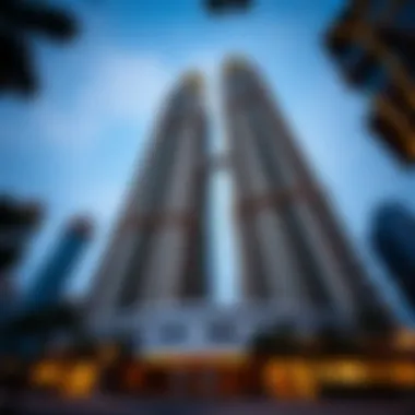 Ground-Level View of Al Naeem Twin Tower View from the base of Al Naeem Twin Tower, highlighting its grandeur