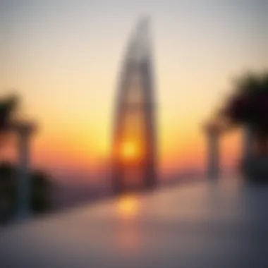 Breathtaking view of Al Hassani Tower against a sunset backdrop