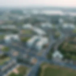 Aerial view of Al Hills City showcasing residential areas and green spaces