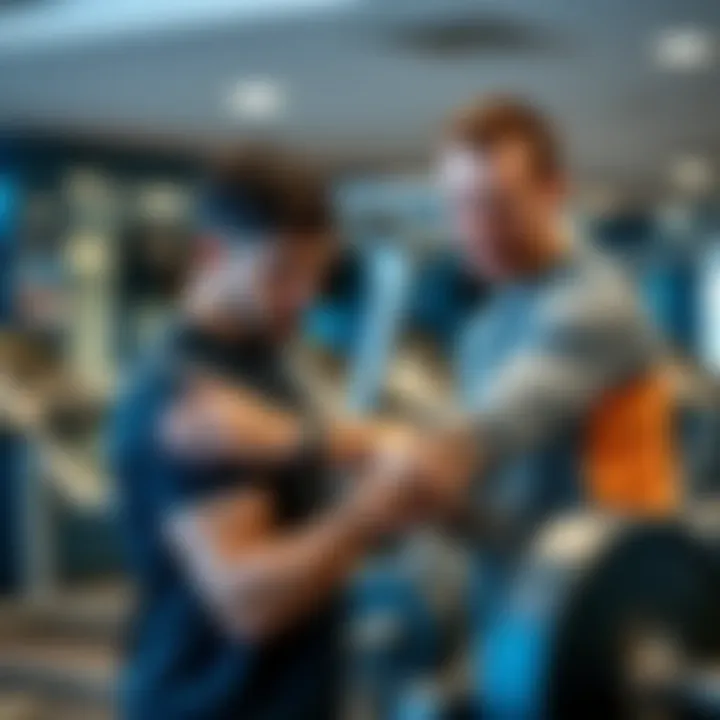 Personal trainer assisting a member