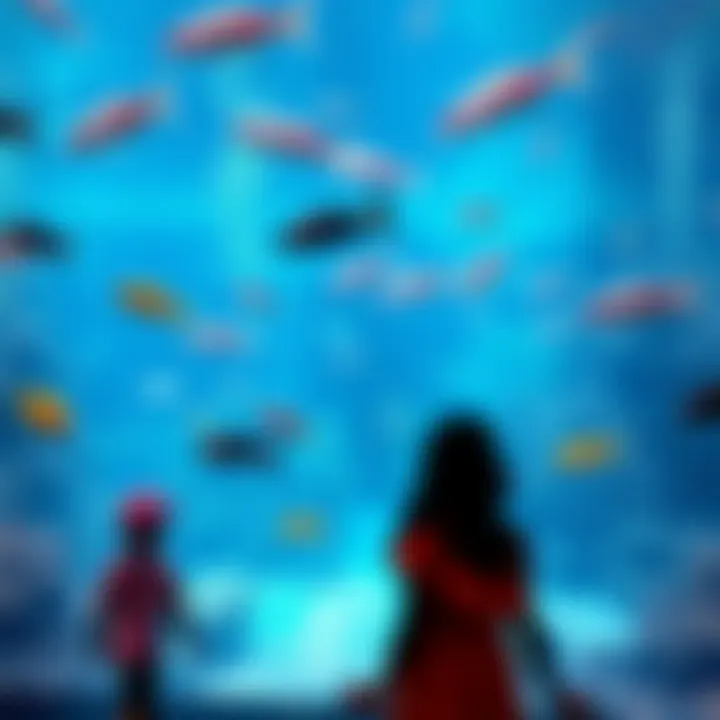 A vibrant scene at Dubai Aquarium, filled with colorful marine life captivating families.