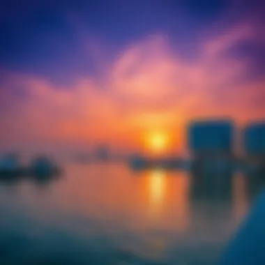 Serene sunset over Yas Island waterfront with reflections on the water